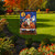Briarwood Lane Haunted Pickup Garden Flag with Halloween design on a lawn garden display.