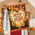 Briarwood Lane Fall Home Sweet Home House Flag with autumn flowers and pumpkins on display.