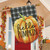 Briarwood Lane Hello Pumpkin fall burlap house flag with black and white gingham background hanging outdoors.