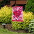 Briarwood Lane pink Patterned Valentine's Hearts Double Sided Garden Flag with black metal stand outdoors.