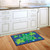 Briarwood Lane Happy Shamrocks Doormat with shamrocks and Happy St. Patrick's Day text on blue background.