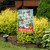 Briarwood Lane Sunshine Daisies garden flag with white daisies, orange butterflies, and welcome sign.