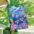 Briarwood Lane Dragonflies House Flag with colorful dragonflies and flowers on blue background.