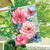 Briarwood Lane Pink Peonies house flag with colorful butterflies and flowers design on blue background.