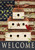 Briarwood Lane Patriotic Birdhouse Garden Flag with white birdhouses, red cardinal, and American flag background.