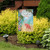 Briarwood Lane Welcome To Paradise garden flag with pink flamingo and tropical design.