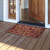 Briarwood Lane Leaf Pattern Coir Doormat, 18 x 30, red and brown leaf design on porch.