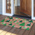 Briarwood Lane Green Trees Medium Coir Doormat 24 x 36 with Christmas tree design and snowflakes.