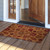 Briarwood Lane Leaf Pattern Medium Coir Doormat, 24 x 36, in warm brown and red tones.