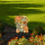 Bountiful Bushel Metal Art garden decoration featuring pumpkins, sunflowers, and gourds in a wooden bucket.