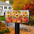 Sunflowers in Pumpkin Mailbox Cover with vibrant orange pumpkins and bright yellow sunflowers on plaid background.