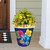 Hello Sunshine Large Planter with colorful floral design and yellow flowers in a blue pot.