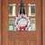 American Wreath Wood Door Hanger with red bow and God Bless America text on white background.