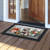 Winter Memories doormat with festive holiday design and "Home Sweet Home" text on wooden porch.