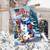 American Snowman House Flag with patriotic snowman, animals, and flag design on a snowy scene.