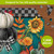 Colorful Pumpkin Stack 1000 Piece Jigsaw Puzzle with sunflowers and leaves on a wooden table top.