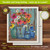 Farm Fresh Flower Swedish Dishcloth with colorful flowers and jars on a wooden background.