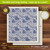 Blue and white floral Swedish dishcloth, 6.75 x 7.5 inches, textured for effective scrubbing.