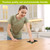Black Bear Family Swedish Dishcloth on a kitchen counter with a woman wiping the surface.