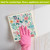 Pastel Flowers Swedish Dishcloth, colorful floral design, pink glove, cleaning tool for countertops and surfaces.