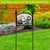 Black White Pumpkins Acrylic Art Sign on stand with decorative pumpkins and garden background display.