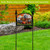 Patterned Pumpkins Acrylic Art Sign on a stand with colorful fall design and black metal frame.