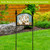 Rejoice Nativity acrylic art sign with three camels on a garden sign stand outdoors.