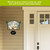 Rejoice Nativity acrylic art sign with animals and angel on beige house exterior wall bracket.