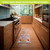 Colorful Flowers Oversized Comfort Mat in a kitchen, bright floral design on soft mat.