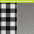 Black and white check oversized comfort mat with waterproof vinyl exterior and slip-resistant back shown.