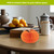 Medium Orange Pumpkin Honeycomb magnetic paper decor on a table, 4.8 x 6.3 inches.