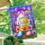 Happy Easter Egg Basket House Flag with colorful eggs, flowers, and butterflies on purple background.