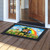 Lucky Irish Gnome Doormat with colorful gnome and rainbow design on wooden porch floor indoors.