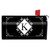 Black mailbox cover with white monogram K design and floral details, red flag raised.