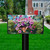 Hummingbirds and Petunias oversized mailbox cover with vibrant pink flowers and colorful hummingbirds on green leaves.