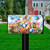 Springtime Bunnies Oversized colorful Easter mailbox cover with bunnies, eggs, flowers, and butterflies design.