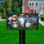 Be a Light Jars colorful mailbox cover with lit candles and flowers on a black mailbox.