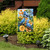 Bluebirds and Roses Garden Flag with blue birds, orange roses and flowers on a garden stand.