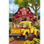 Yellow vintage truck with flowers and dog, parked in front of red barn with white trim.