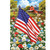 American flag on a garden flag with flowers, barn, and horse in the background scene.