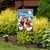 Bless This Home garden flag with cardinals, flowers on black and white checkered background outdoor decor.