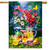 American Lemonade House Flag with floral design and patriotic elements on grass outdoors.