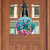 Springtime Hummingbirds Wood Door Hanger with colorful hummingbirds and flowers on a wooden door.