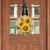 Sunflower Duo Wood Door Hanger with yellow sunflowers and brown checkered pattern on a wooden door.