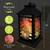 Briarwood Lane black metal lantern with striped geraniums and shatter-resistant acrylic panels, battery powered.