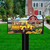 Flower Farm Mailbox Cover with yellow vintage truck and colorful flowers on a black mailbox post.