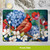 Birds in the Garden Placemat with red cardinal, blue hydrangeas, and white flowers, silverware setting.