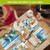Welcome To the Beach Placemat set of 4 colorful beach-themed table mats with house design.