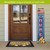 Patriotic Welcome Pine reversible porch leaner with American flag design and sunflowers on a blue background.