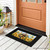 Black Goldfinches and Sunflowers Mini Mat on a porch with brown door and lantern.